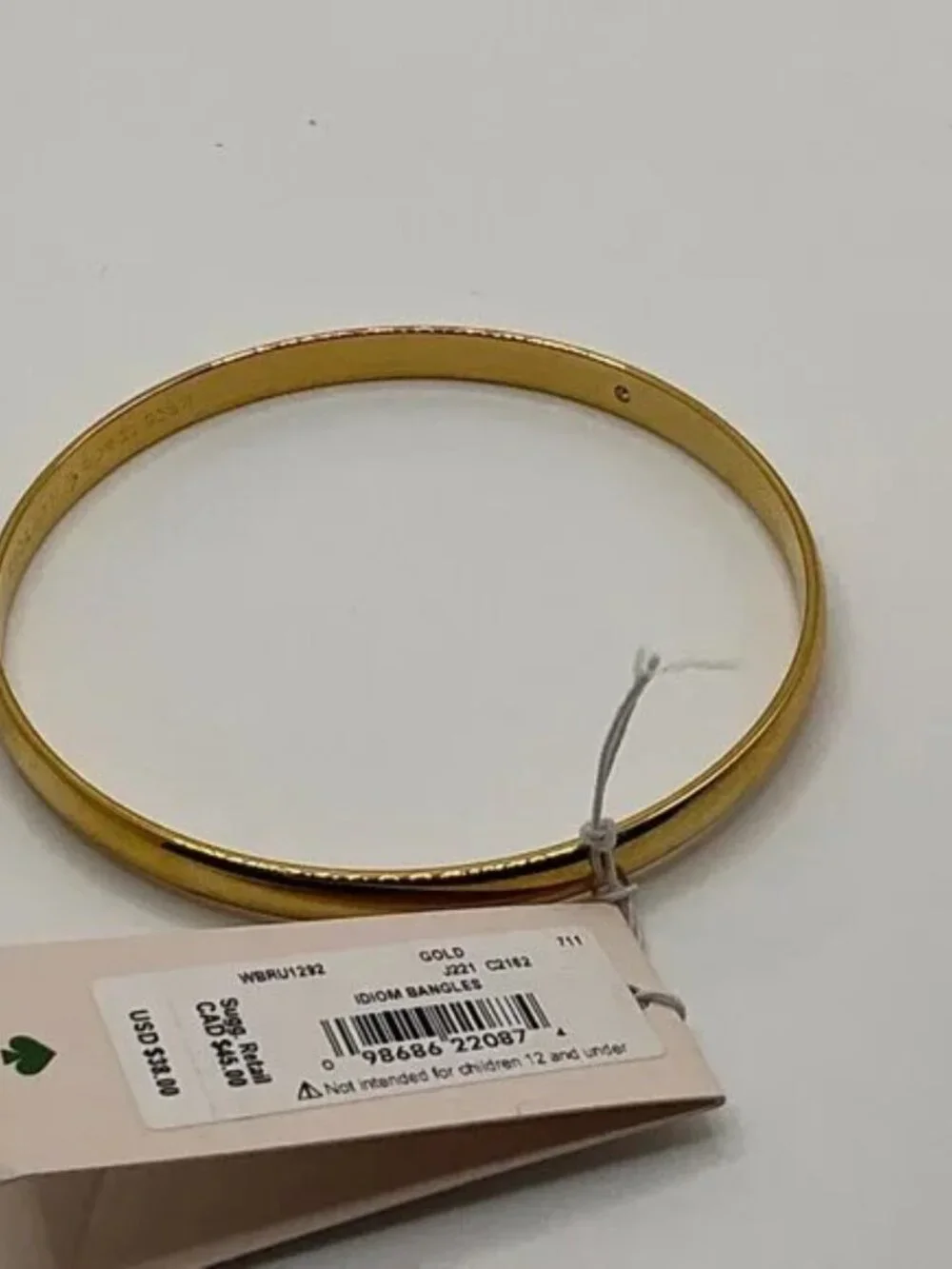 Kate Spade New York TAKE A BOW Gold & Cream/Idiom Gold-Tone Bangle Bracelet - Picture 3 of 9